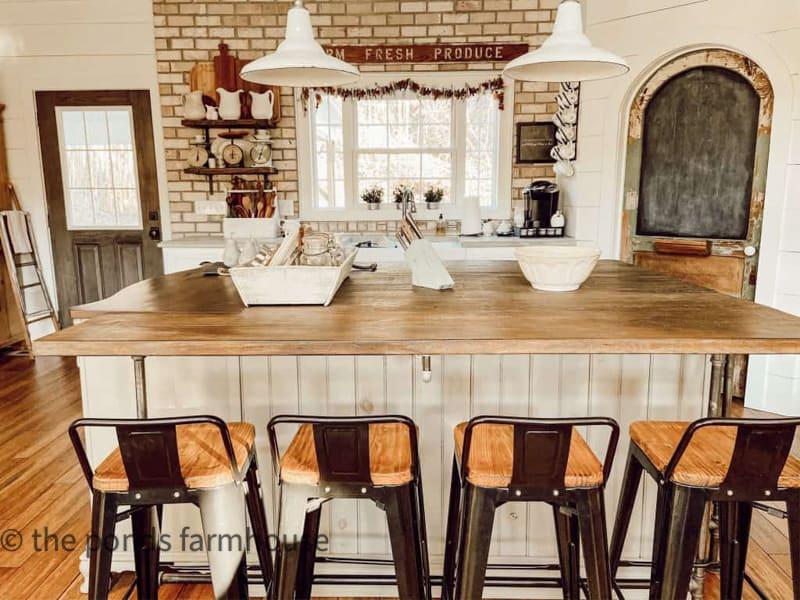 Farmhouse kitchen island where family and friends gather for ​cooking and chatting