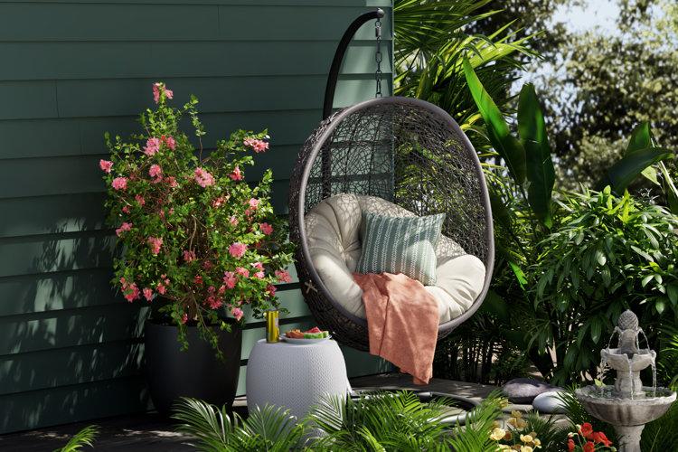 Design a cozy reading nook with comfortable chairs‍ and bookshelves ‍in your backyard design