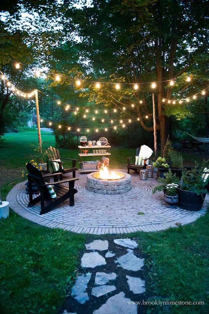 Install string lights to add warmth and charm to your backyard design