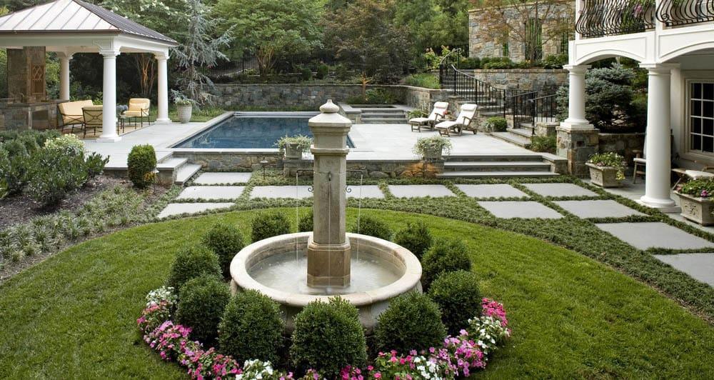 Add a fountain to enhance tranquility and sophistication in your backyard design