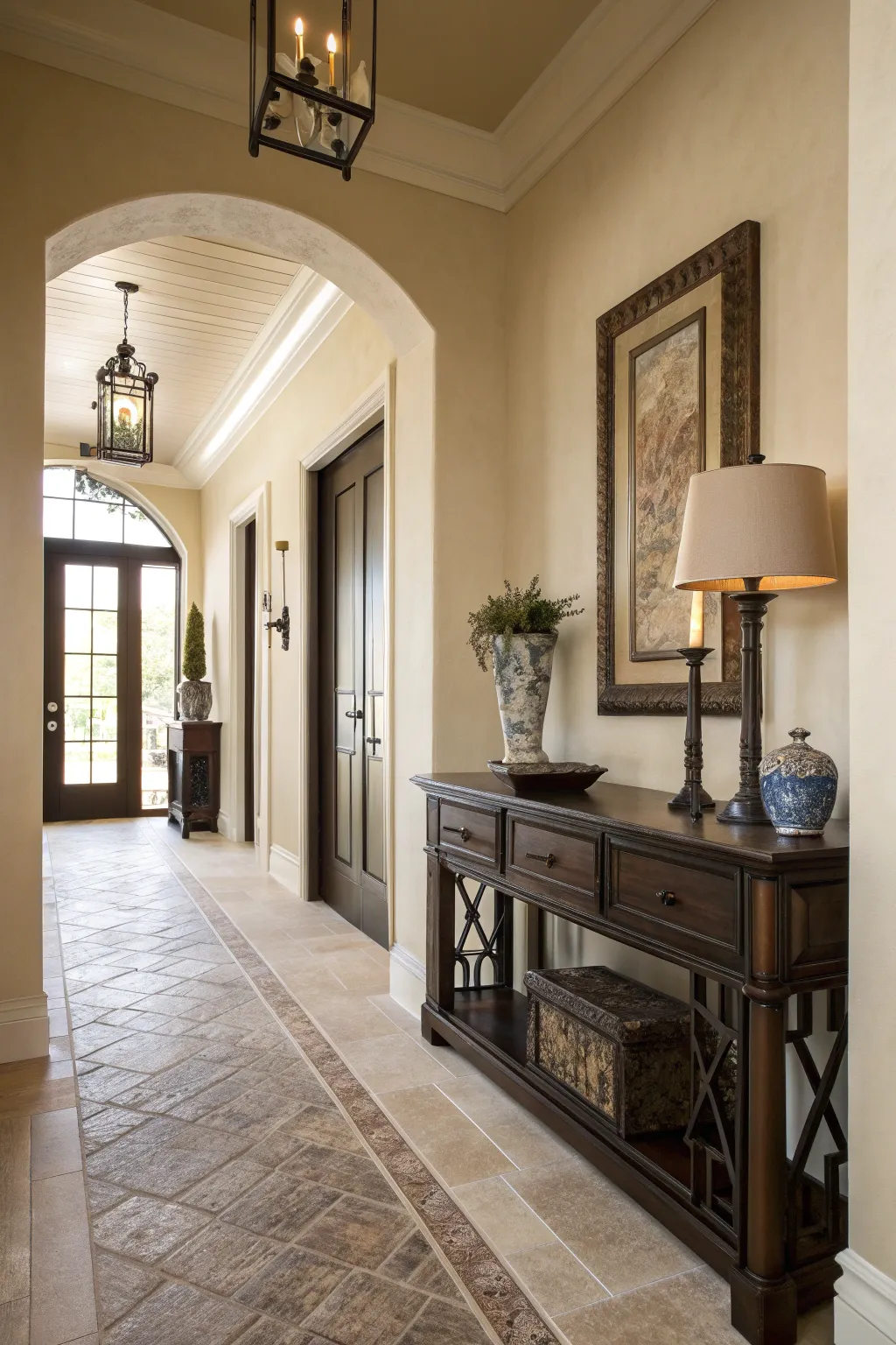 A cozy hallway with soft beige walls and dark wood accents, featuring a console table.