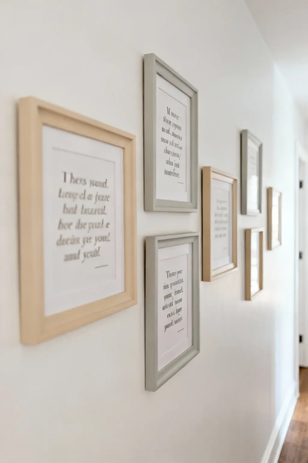 A hallway displaying framed quotes that add a personal touch.