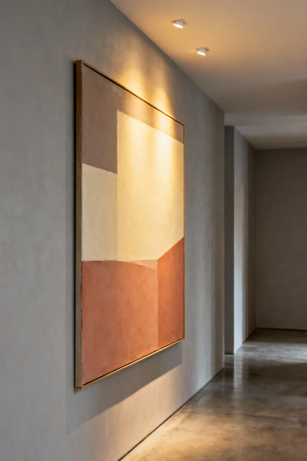 A neutral color block painting serving as art in a hallway.