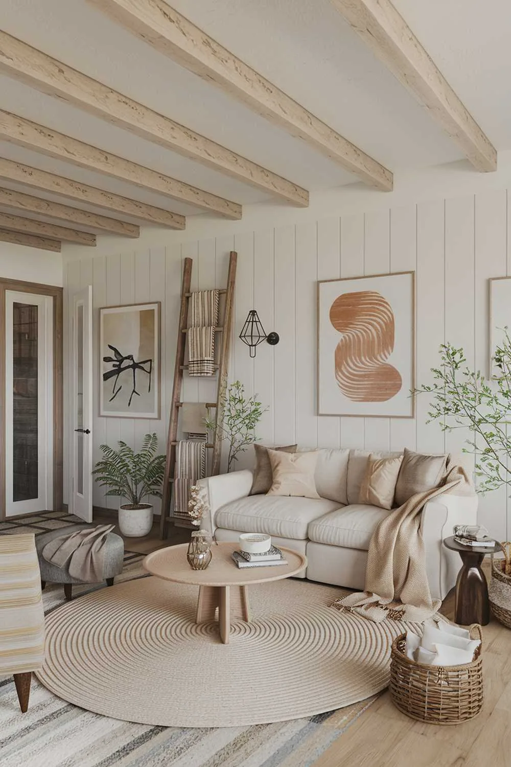 Cozy modern farmhouse living room with beige sofa, round beige rug, wooden coffee table, potted plants, decorative basket, wooden ladder leaning against wall, white walls, wooden beams, and artwork.