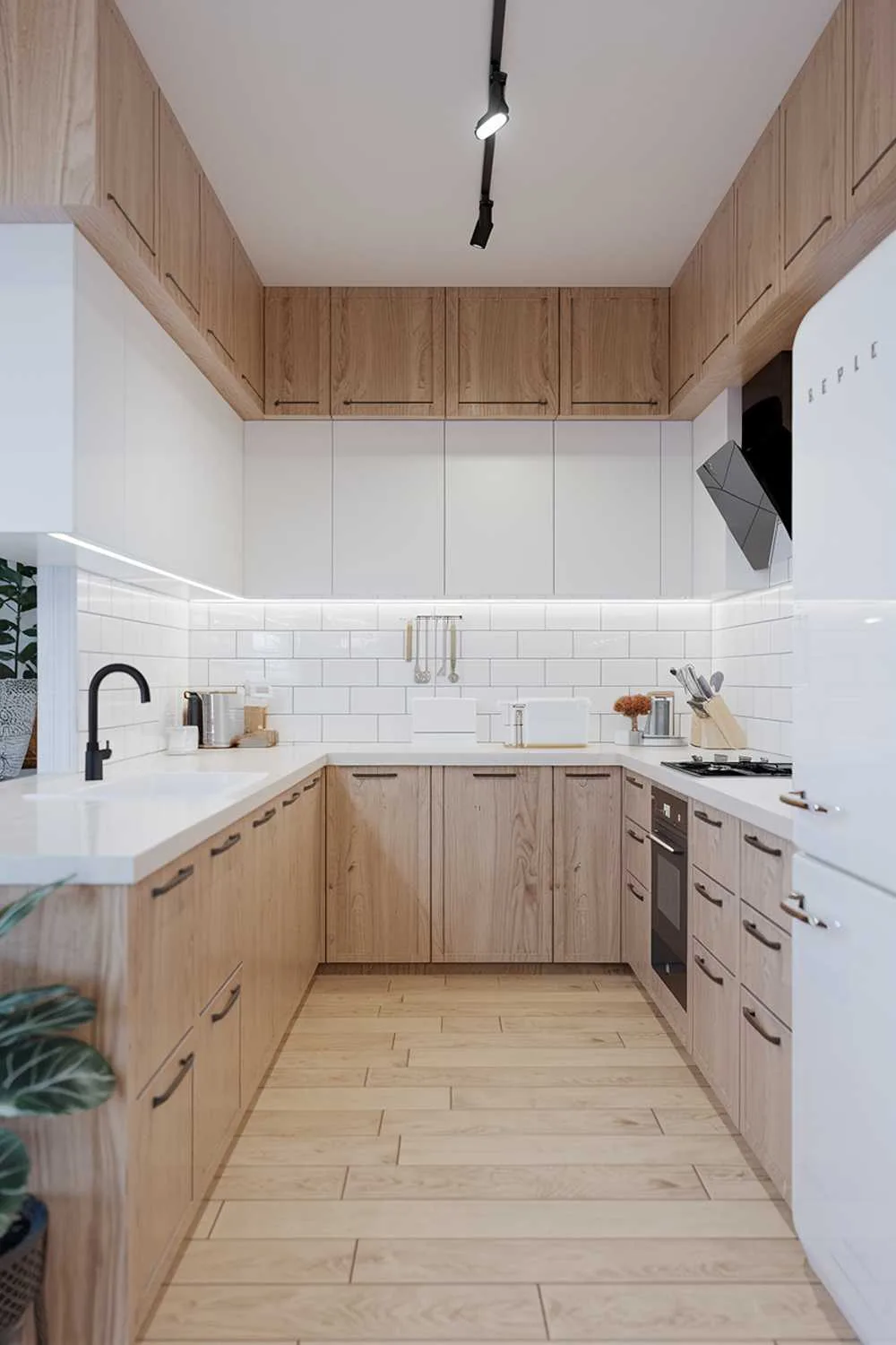 Light wood Scandinavian kitchen with white cabinets, black faucet, and bright lighting