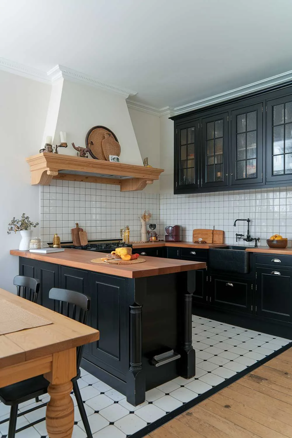Kitchen with black island, wooden countertop, black cabinets, white tile backsplash, and wooden dining table