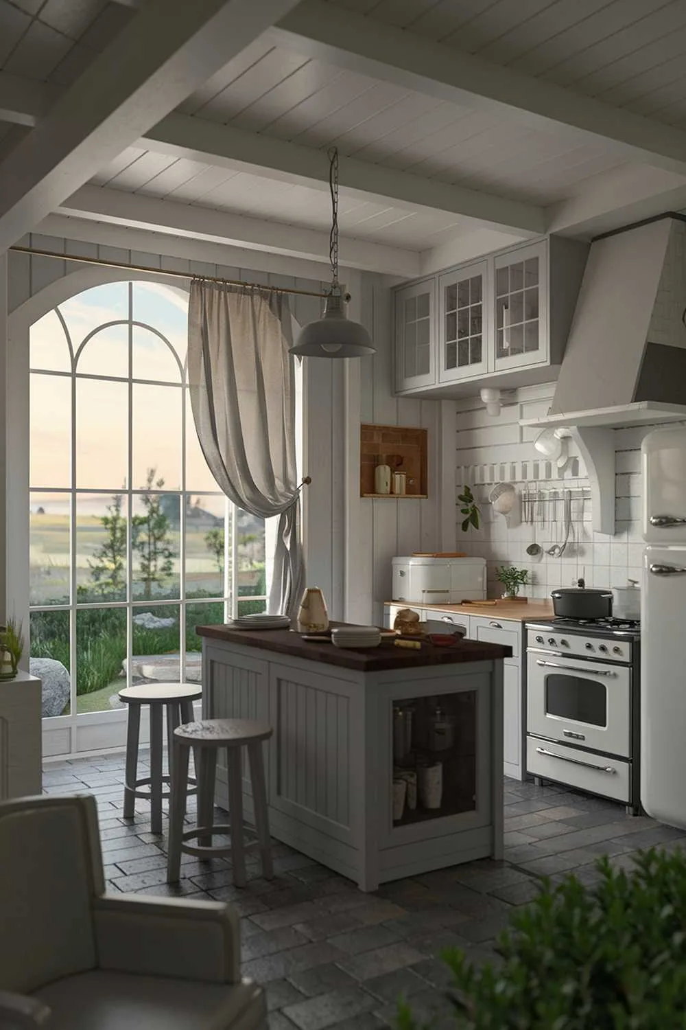 Bright kitchen with large window, gray island with wooden top, white cabinets, and indoor plants.