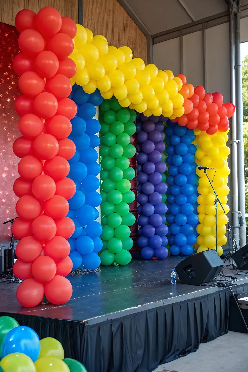 A colorful balloon wall serves as a striking event backdrop.