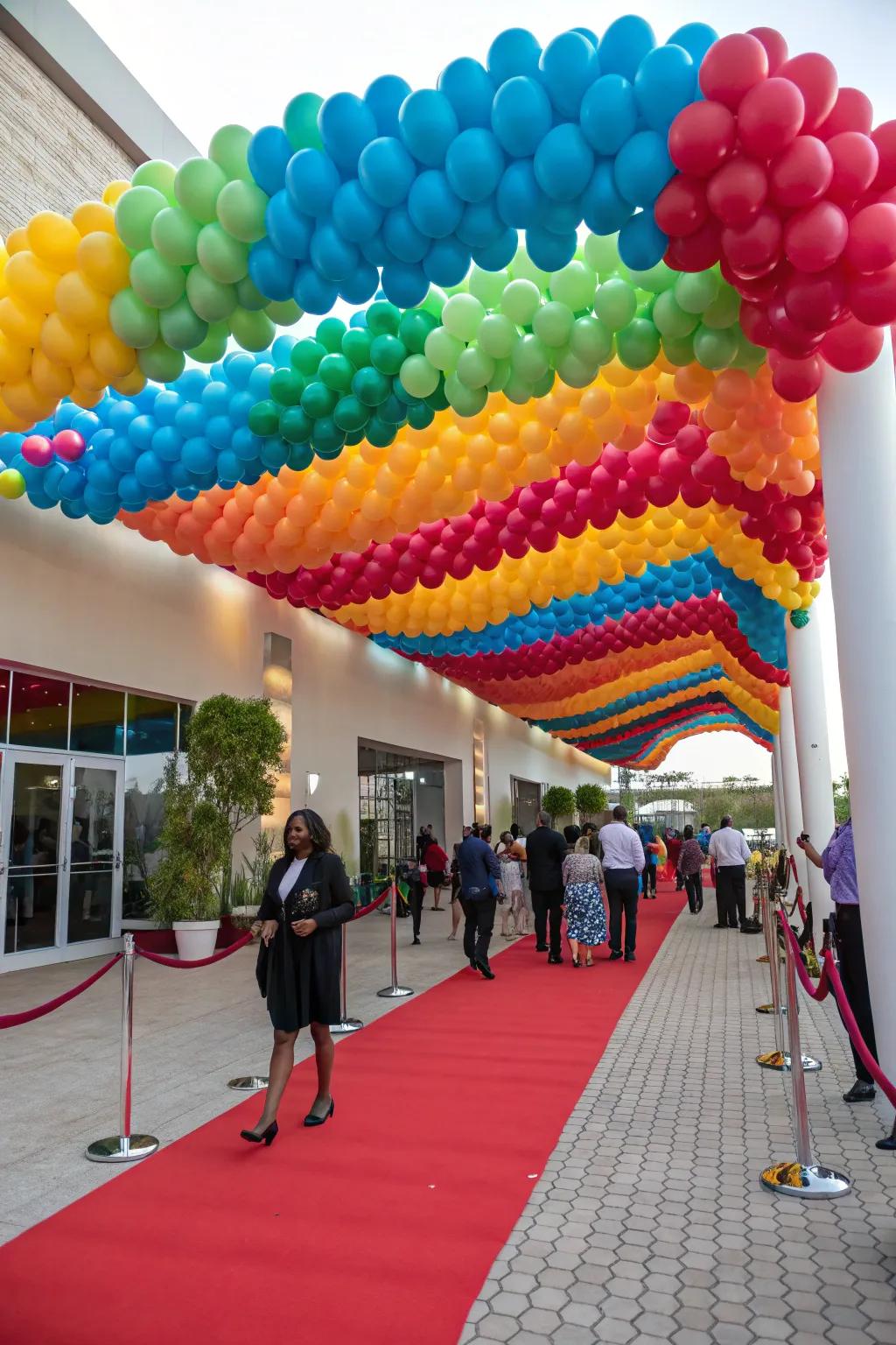 A whimsical balloon canopy overhead at an event.