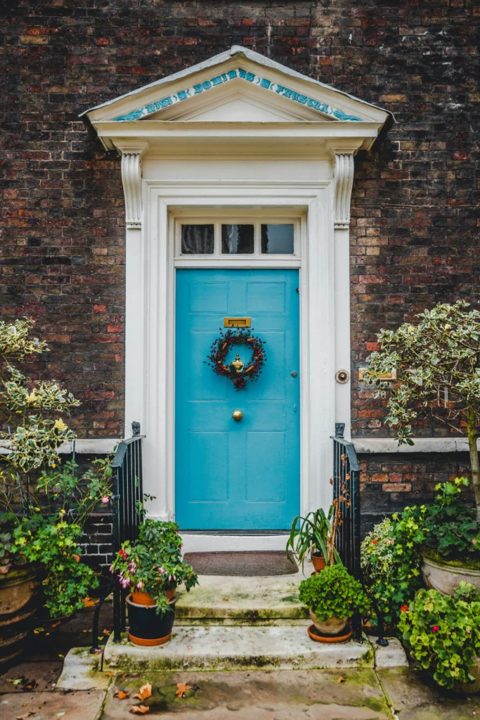Teal Door with Festive Wreath