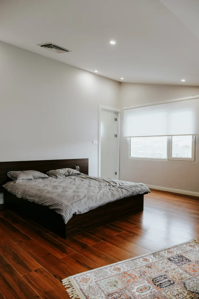 Minimalist Bedroom with Dark Wood