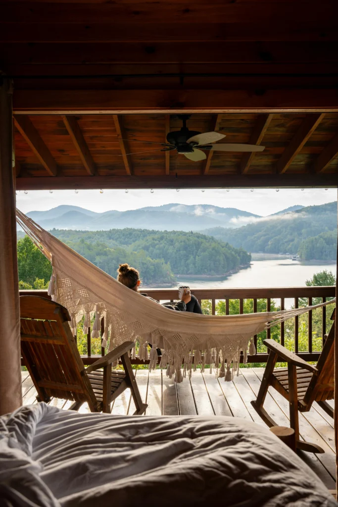 Outdoor Deck with Lake View and Macrame Hammock