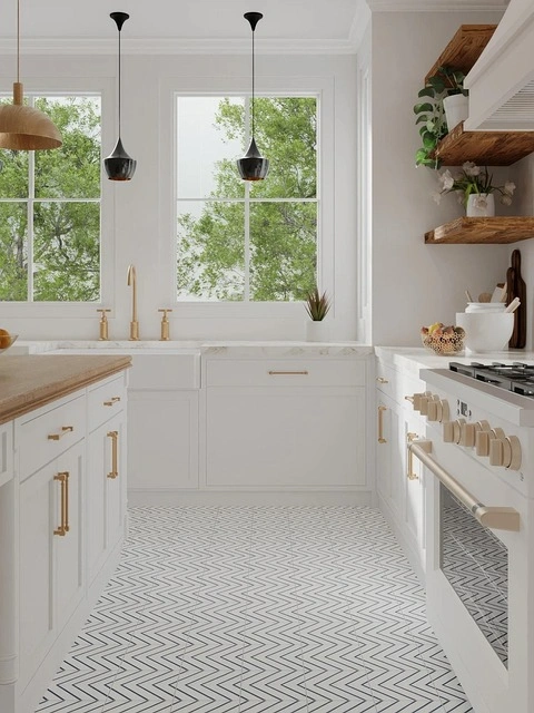White kitchen with chevron floor and brass hardware