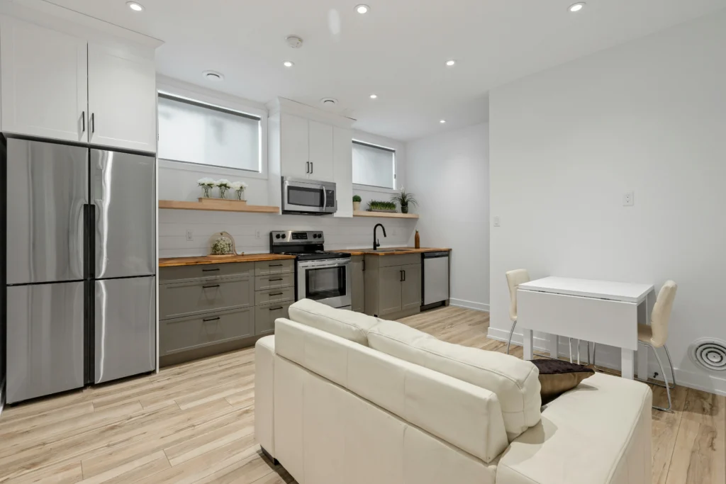 Modern kitchen with two-toned cabinets and stainless steel appliances