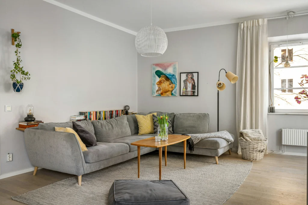 Cozy eclectic living room with colorful pillows and mixed materials