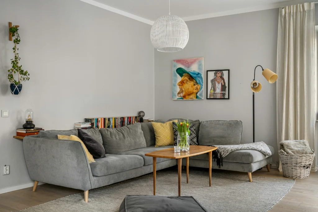Living room with grey palette and yellow accents