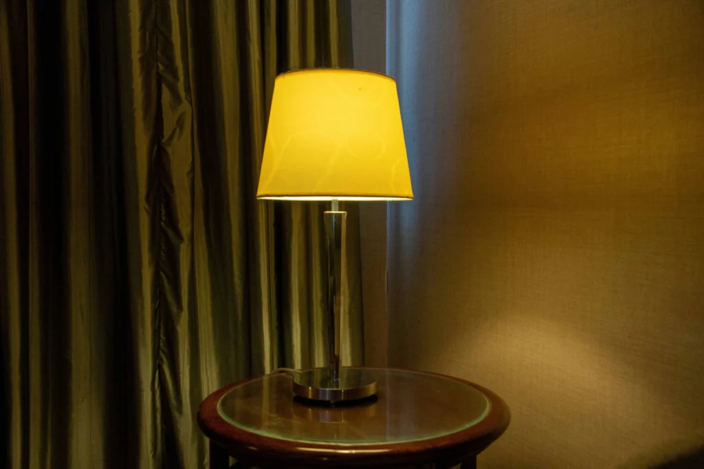 Yellow lamp lighting up a room