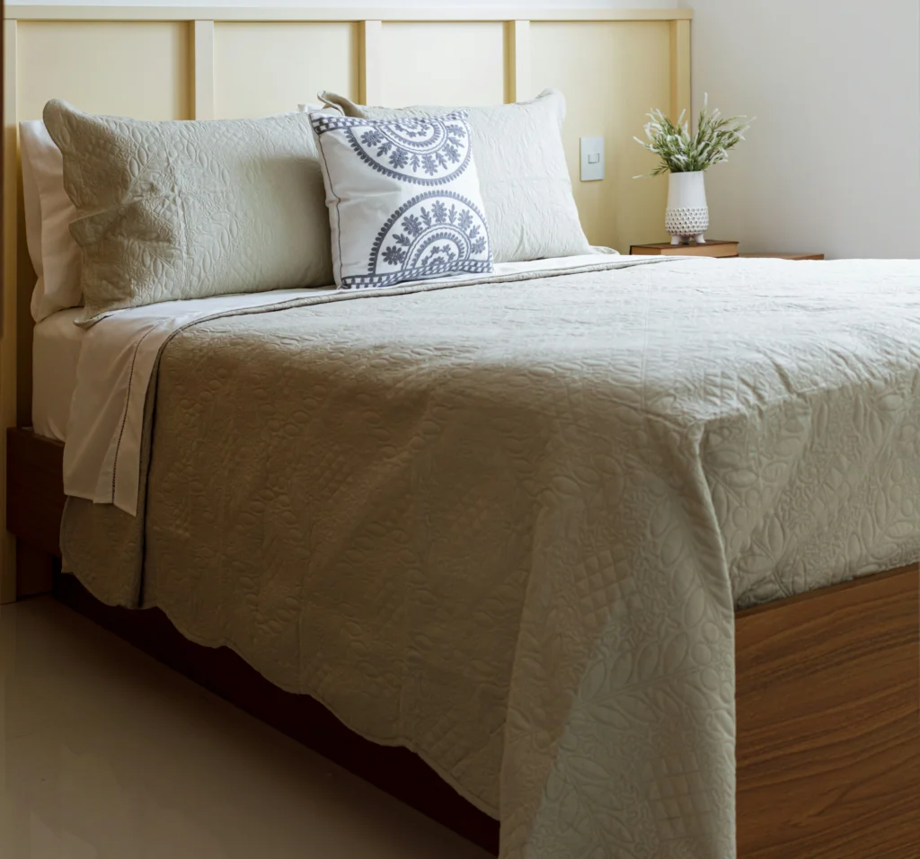 Neutral bedroom with textured headboard