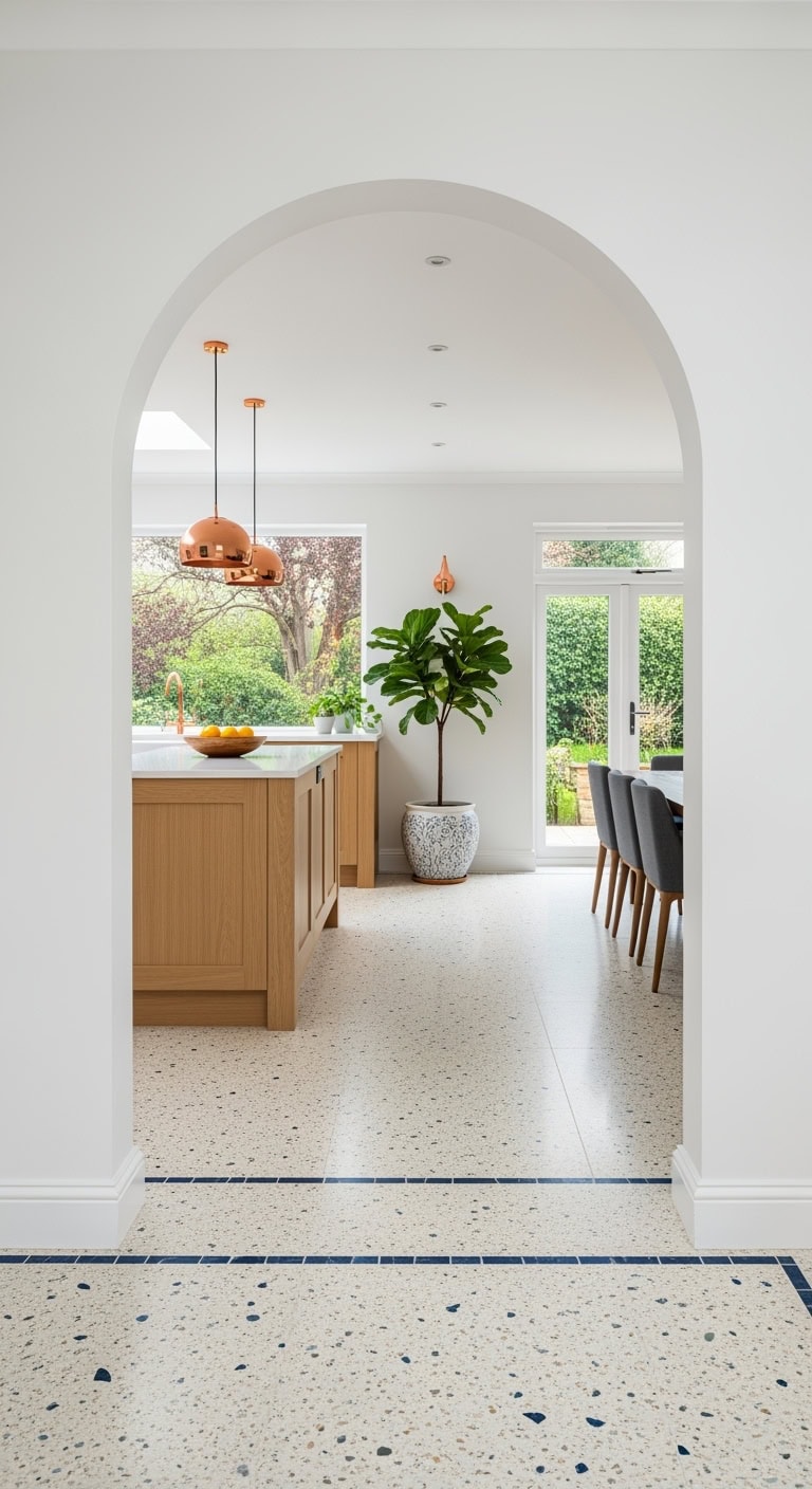 Terrazzo embedded arch floor transition