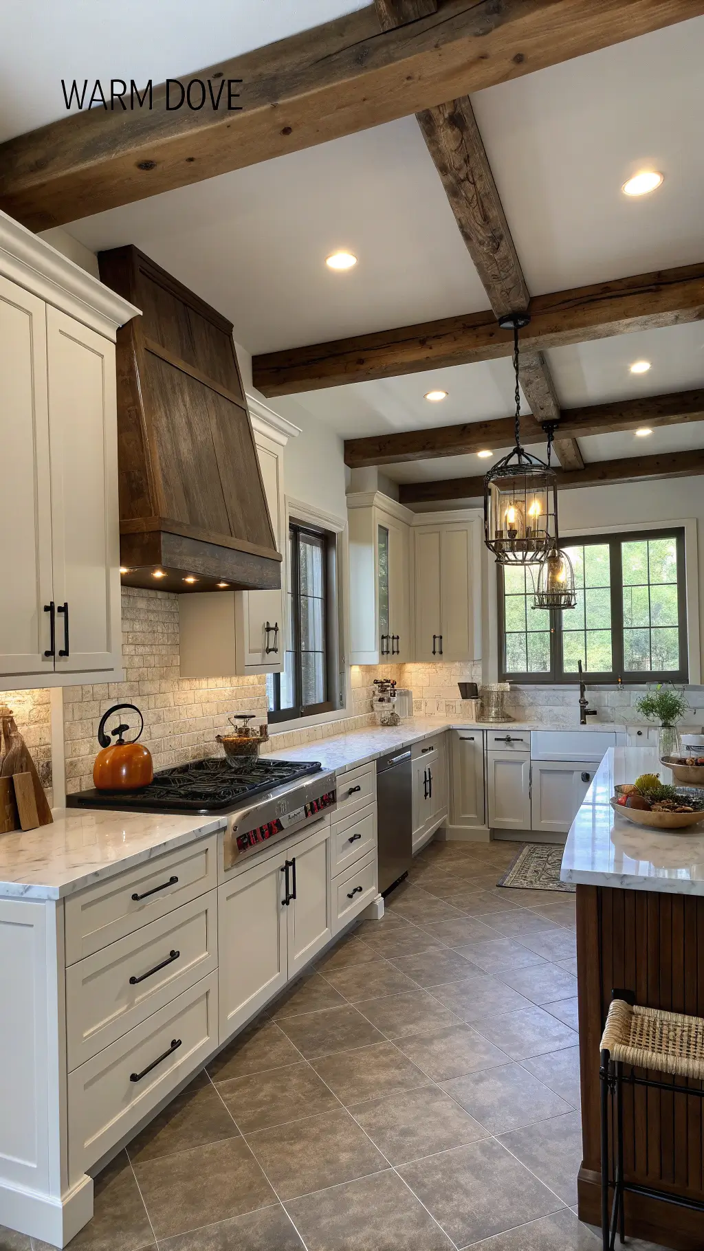 Modern farmhouse kitchen with off-white cabinets and copper accents