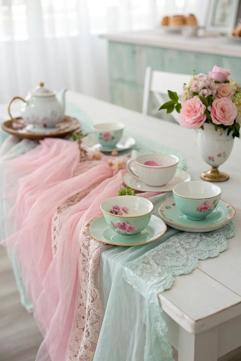 Vintage tea party with pastel cheesecloth runner