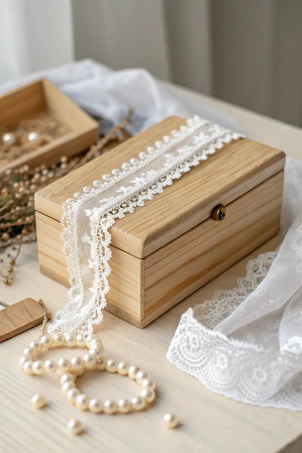 Vintage-inspired jewelry box adorned with lace and pearls, perfect for treasured keepsakes.