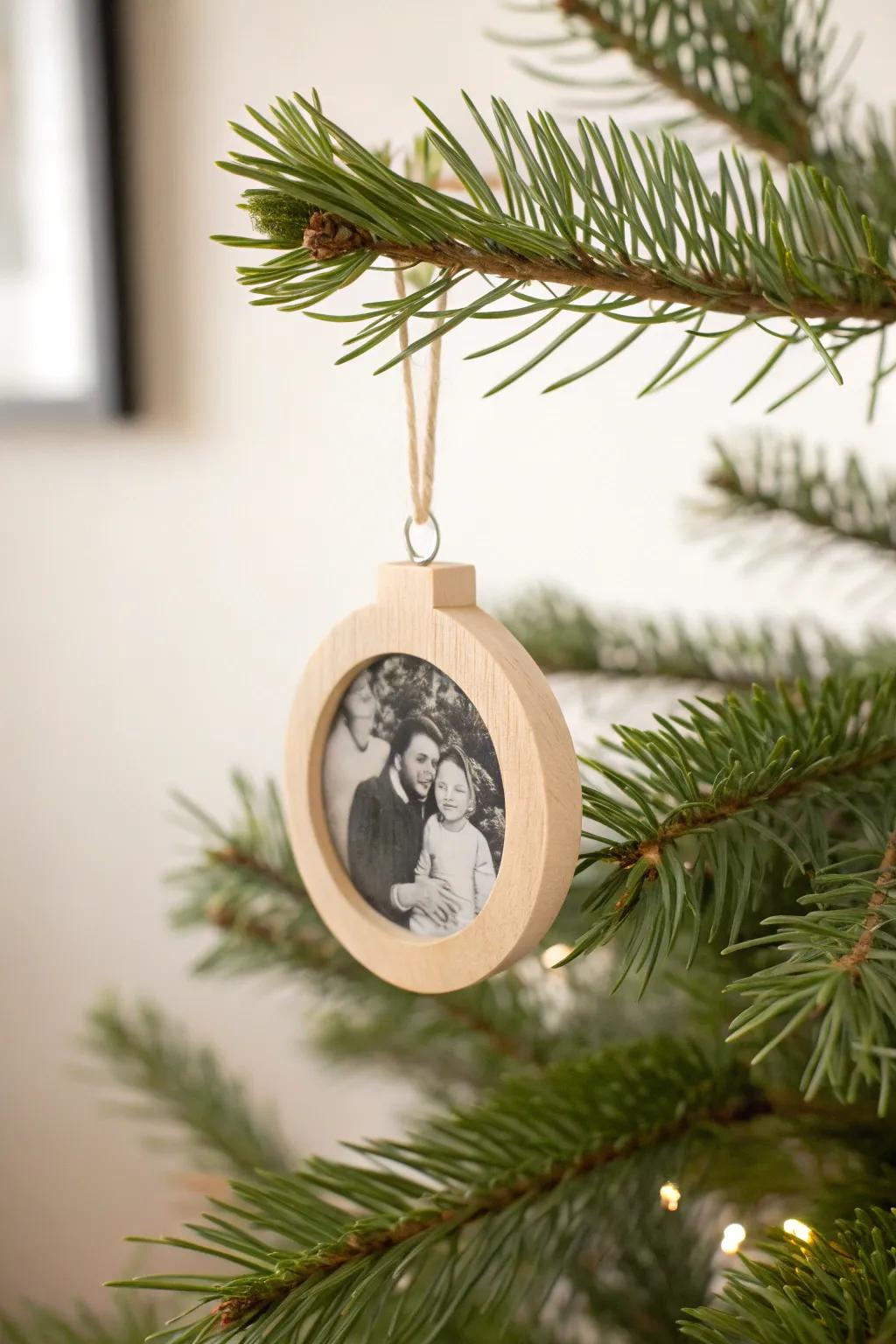 Create timeless keepsakes by incorporating family photos into your Christmas tree decorations.