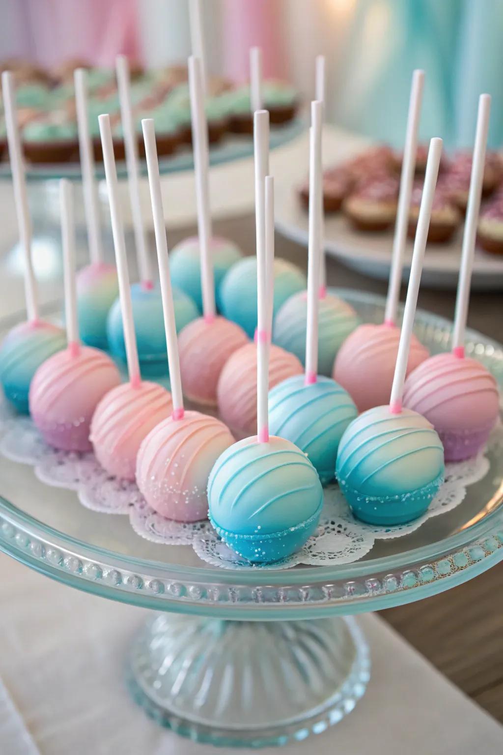 Soft pastel ombre cake pops adding artistic charm.