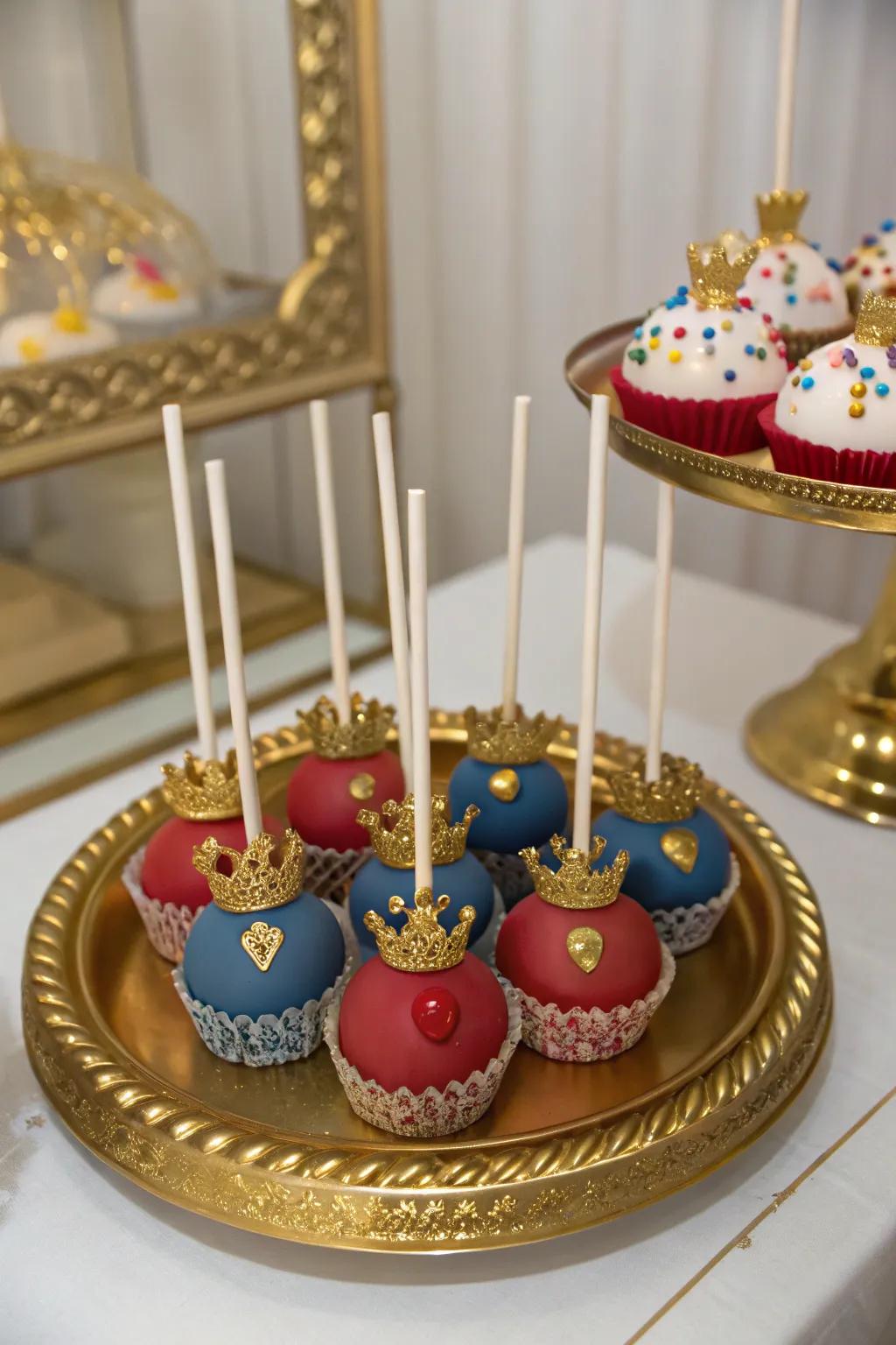 Prince and princess themed cake pops for a royal baby shower.