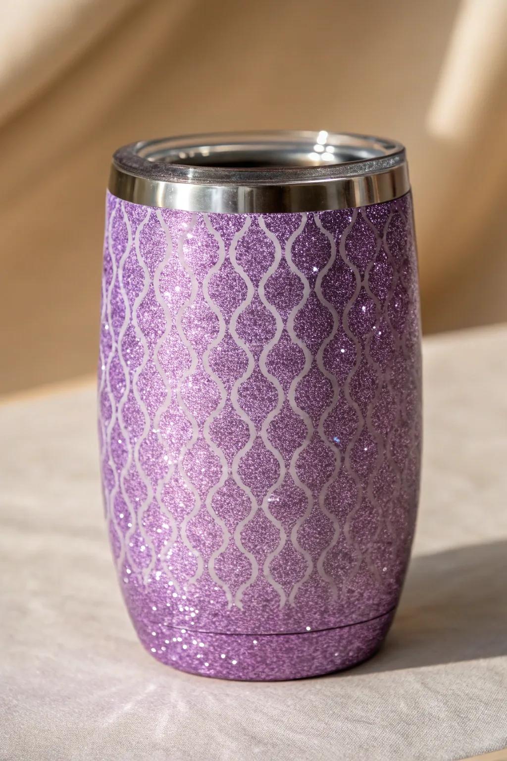 Explore tactile elegance with layered glitter textures on a purple tumbler.