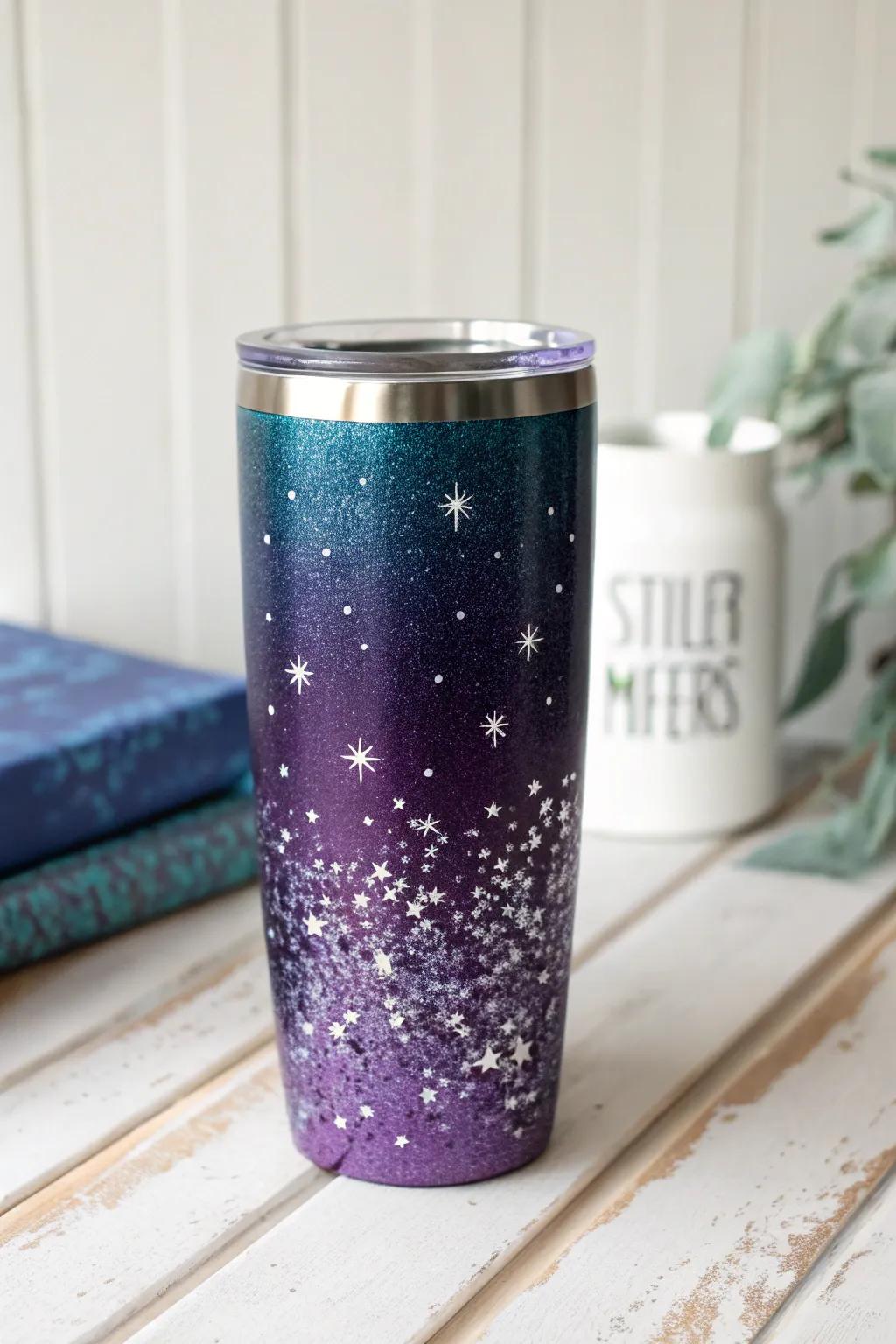 Create a galaxy-inspired tumbler with dark purples, blues, and silver glitter.