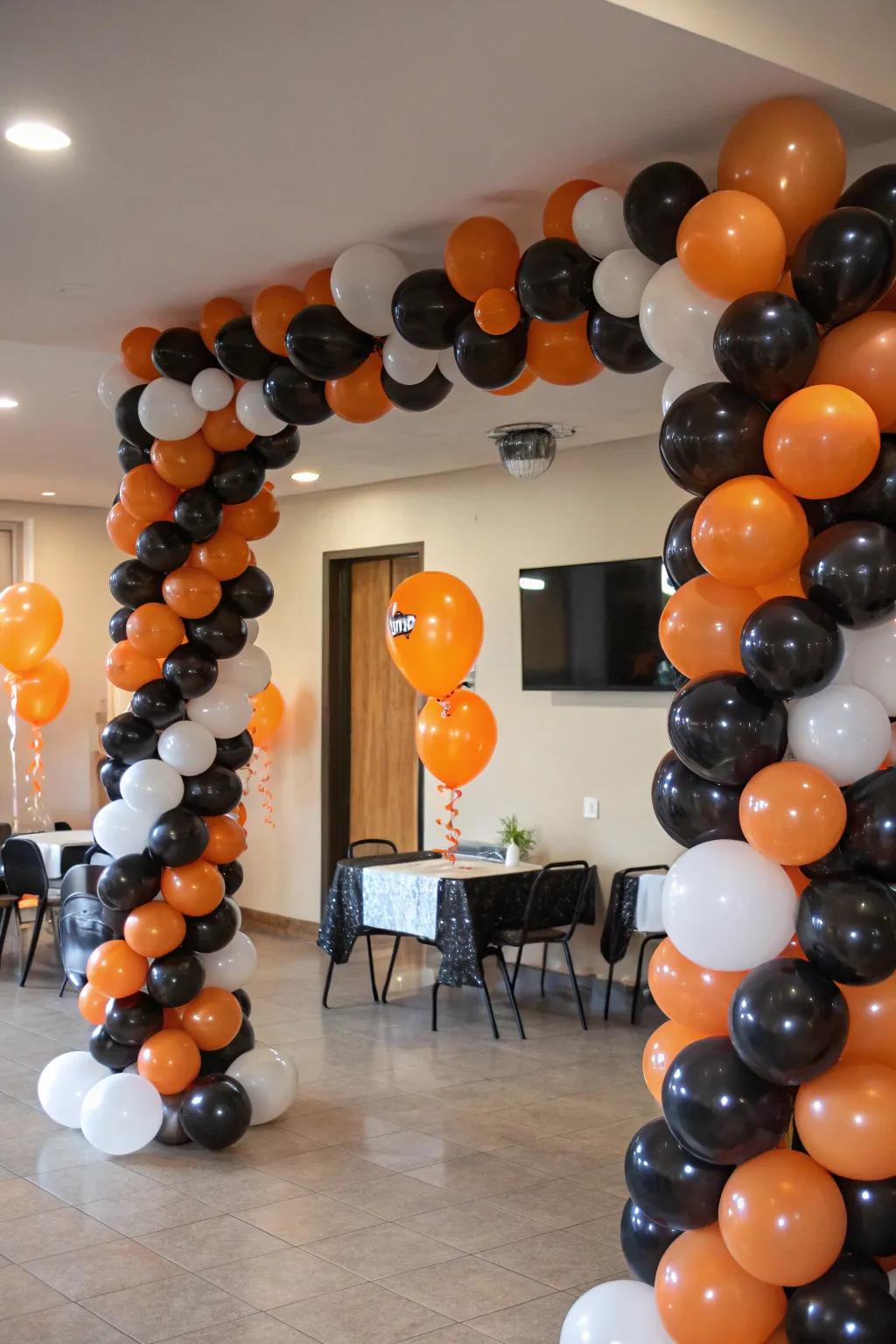 Add vibrant Halloween colors with balloon decor.